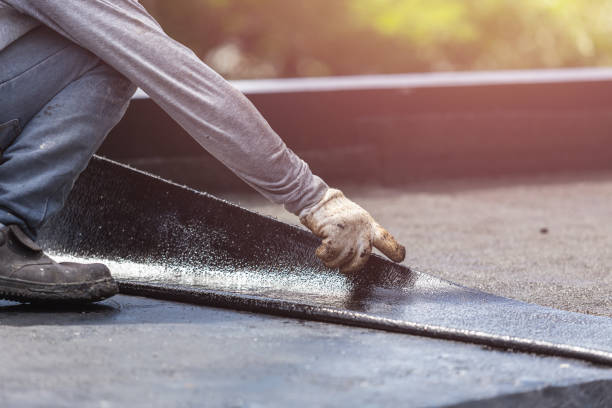 Professional Waterproofing technician working in Arlington, KS